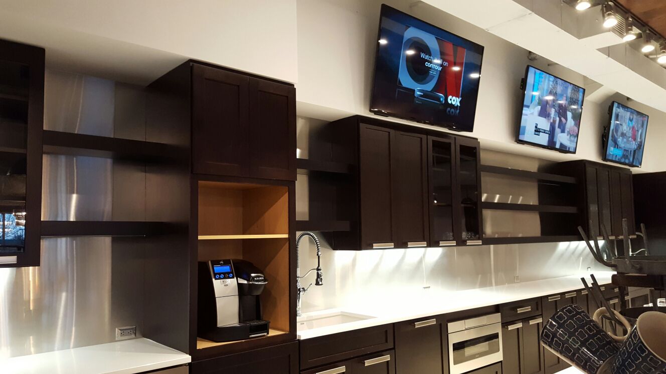 ANBIZA stainless steel countertop and backsplash in a corporate break room