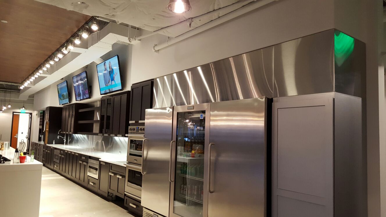 ANBIZA stainless steel counters and backsplash in a commercial kitchen