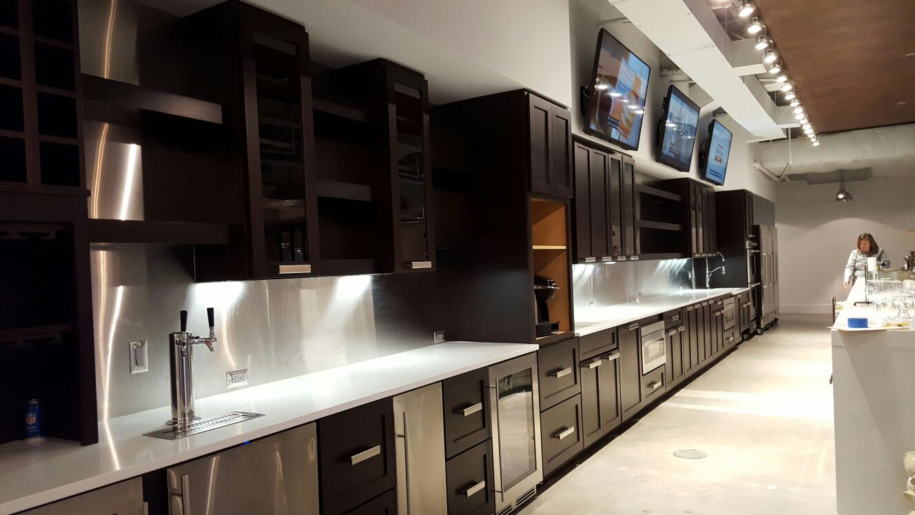 ANBIZA countertop and stainless steel backsplash in a corporate kitchen